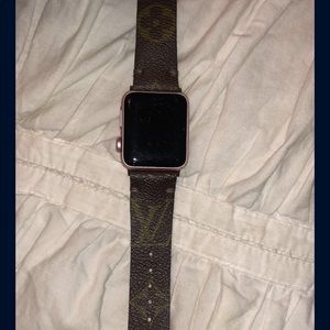 Rose gold Apple Watch with Louis Vuitton band